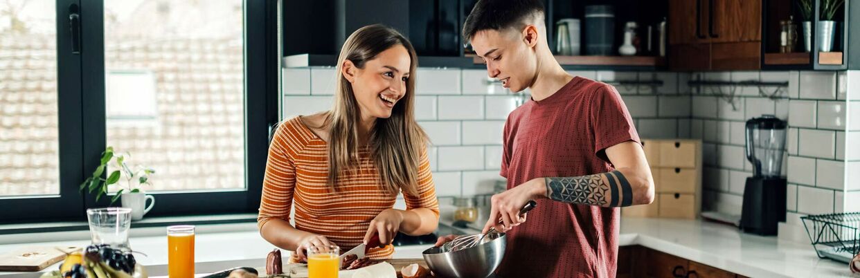 As1228275025 couple cooking together